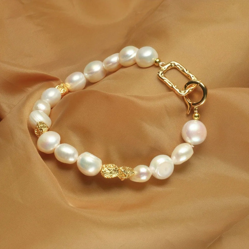 Pulseira pérola banhada a ouro