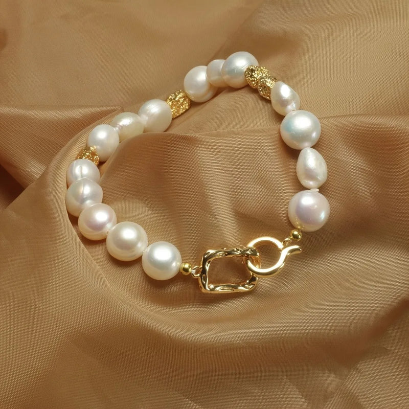 Pulseira pérola banhada a ouro