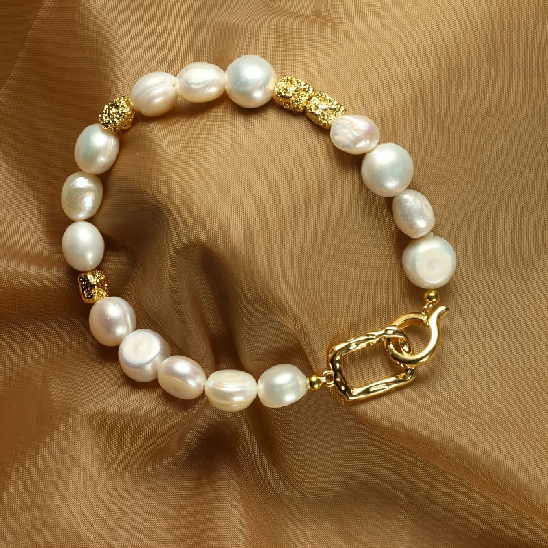 Pulseira pérola banhada a ouro